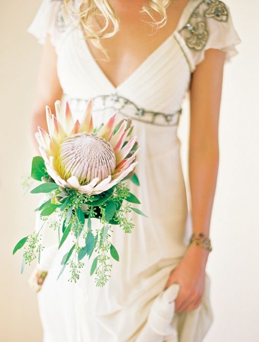 __opt__aboutcom__coeus__resources__content_migration__brides__public__brides-services__production__2017__03__28__58dab0df7f9d9043bd6a7b67_king-protea-bridal-bouquets-1-cbf44902eb744a8b8e2c10e2275b3bb1.jpg