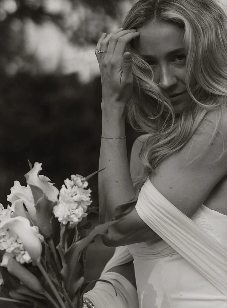 Model wearing a bridal white dress