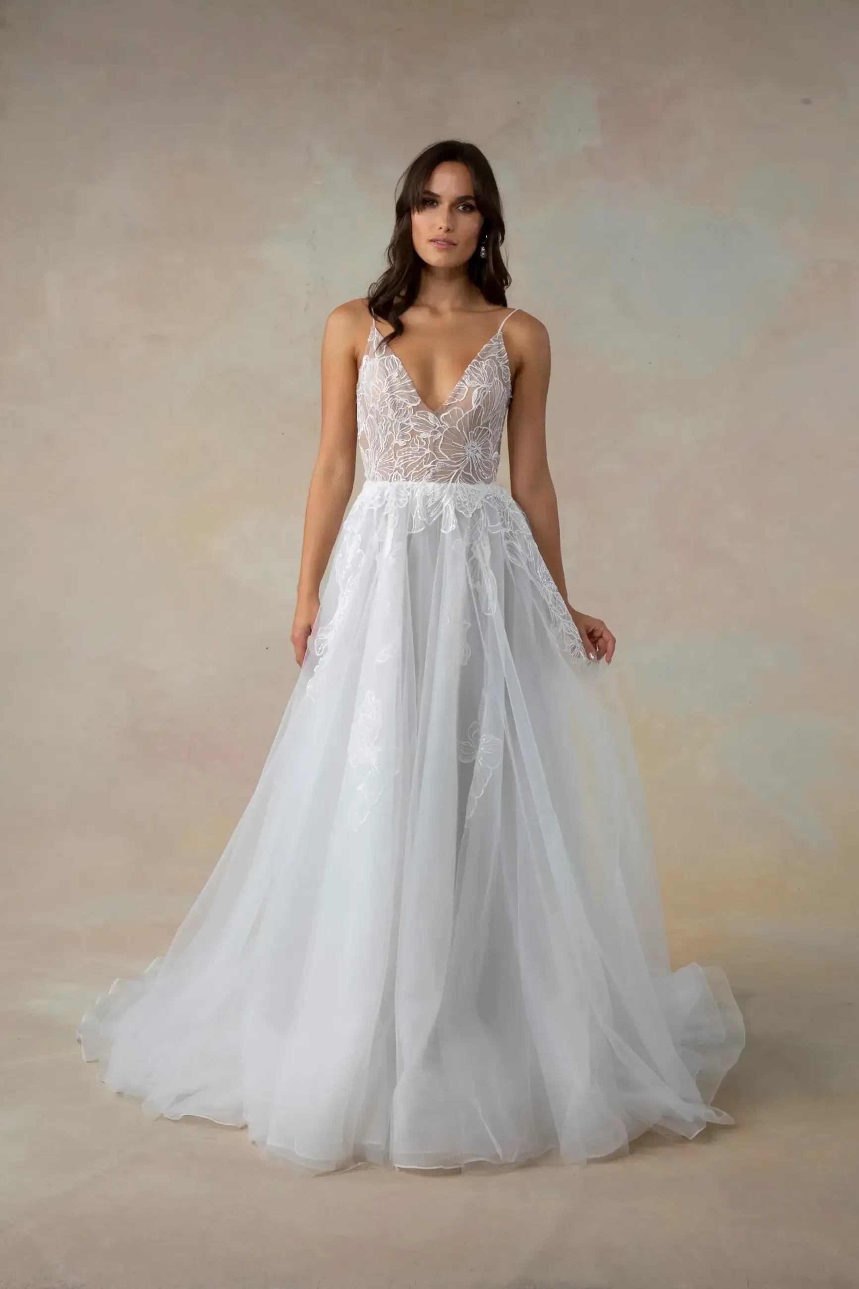 Model wearing a Tara Lauren gown