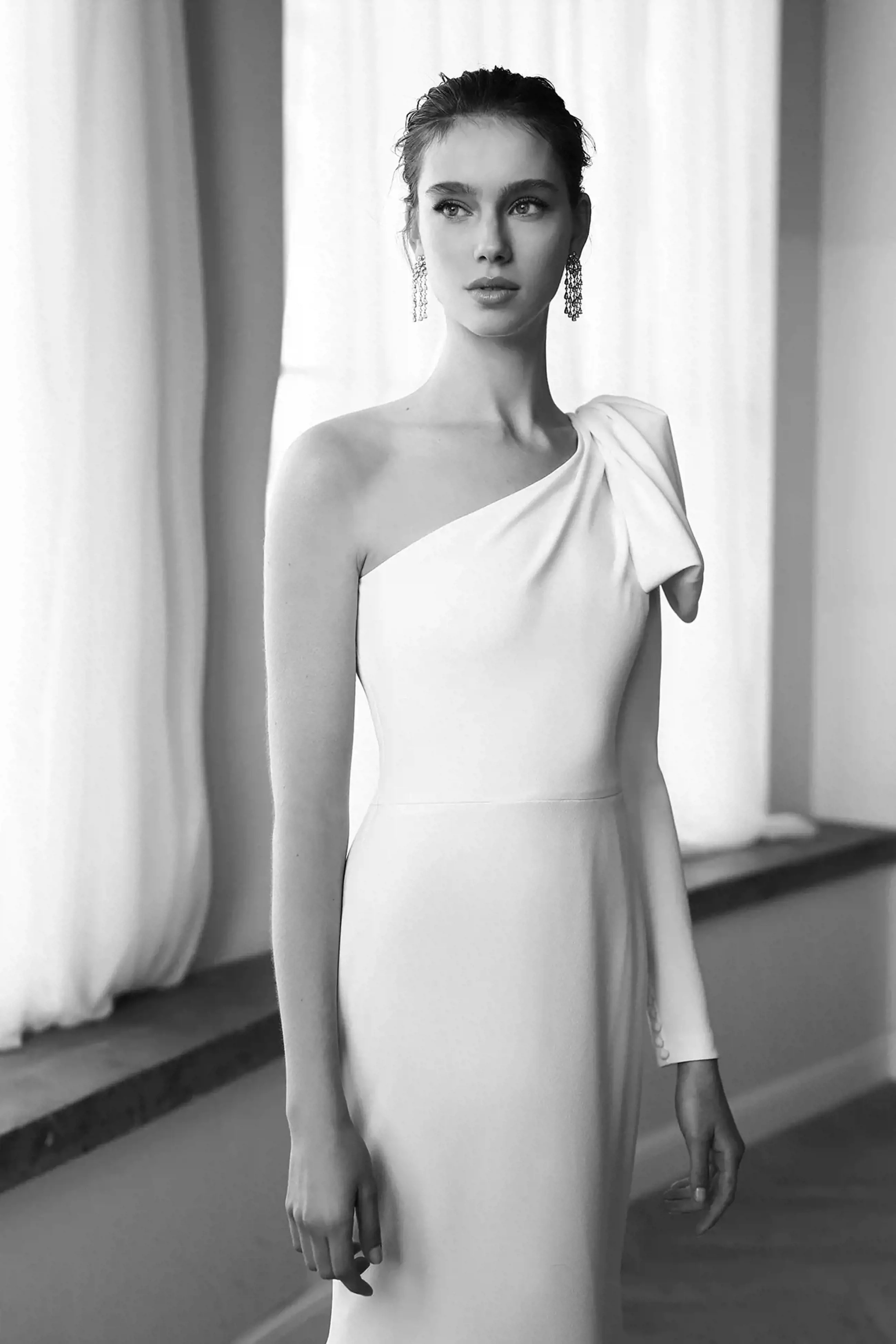 Model wearing a Lihi Hod gown